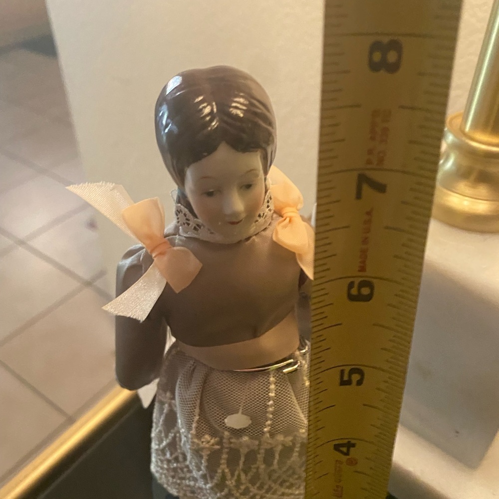 Vintage China porcelain doll w stand
